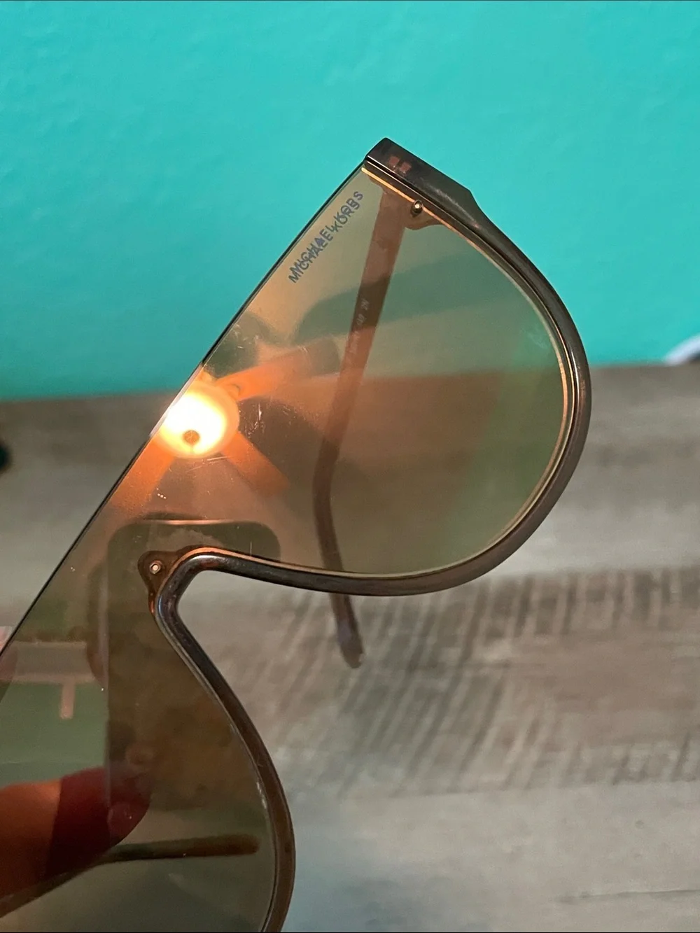 Michael Kors Unisex MK2151 Aspen Amber Rimless Shield Sunglasses